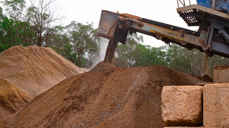 About - crushed earth converyor into mound - 1400